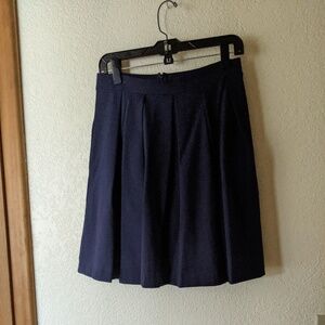 Deep navy blue A-line skirt with pockets